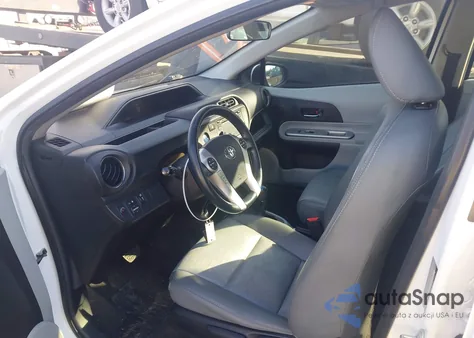 2013 Toyota Prius C Four from USA, damaged, VIN JTDKDTB30D1047003